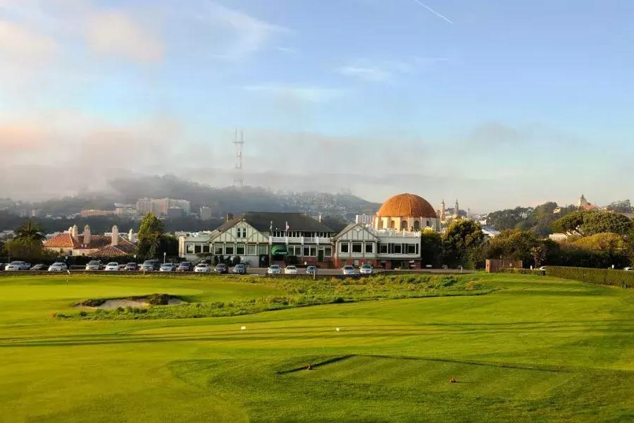 的 greens of the Presidio Golf Course shine on a sunny San Francisco day.